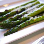 Savor Smoky Grilled Asparagus Topped with Parmesan Bliss