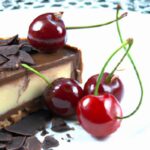 Indulgent Chocolate Ganache Tart with Juicy Cherry Bliss