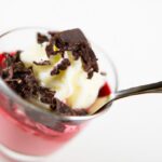 Decadent Raspberry Mousse with Elegant Chocolate Shavings
